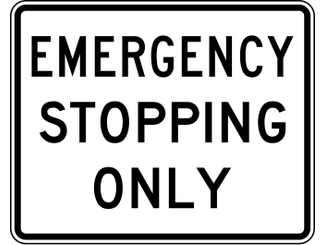 Emergency Stopping Only sign: white rectangle with the words EMERGENCY STOPPING ONLY.
