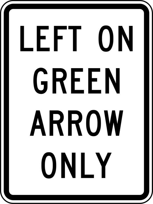 Left on Green Arrow Only sign: white rectangle with the words LEFT ON GREEN ARROW ONLY.