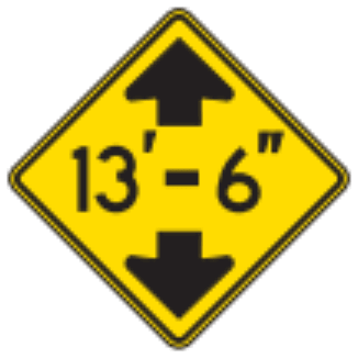Low Clearance sign: yellow diamond showing a height (13 feet 6 inches) between an up arrow and a down arrow.
