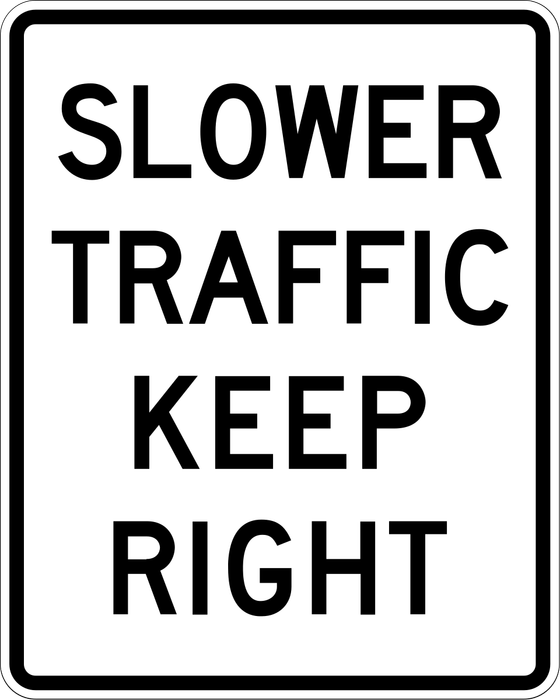 Slower Traffic Keep Right sign: white rectangle with the words SLOWER TRAFFIC KEEP RIGHT.