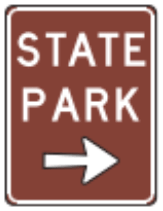 State Park sign: brown rectangle with the words STATE PARK and a white arrow.